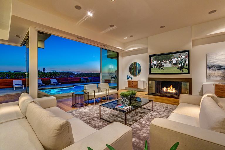 This one takes the open concept to the next level. The entire back wall is nearly all windows and slide open to take the living area outside. This great room is the perfect place to watch the football game and the kids in the pool. .
.
.
.

#realestate #larealestate #luxuryrealestate #luxuryhomes #luxury_homes #highclasshomes #losangelesphotographer #creativevisionstudios #losangeles #architecture #milliondollarlisting #realestatemarketing #realestatephotography #instapic #instagram #photooftheday #archilovers #view #architecturaldigest #twilight #beautiful #amazing #pool #hollywood #hollywoodhills #sunset Blvd #fireplace #open #windows
